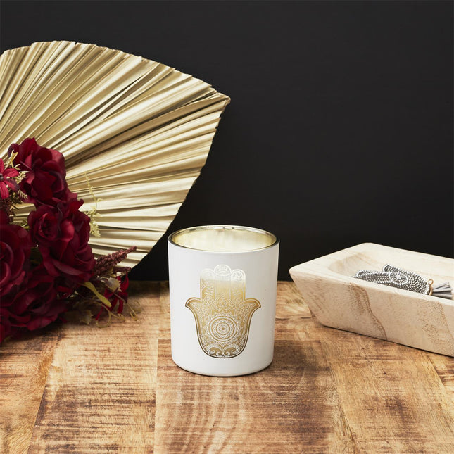 Aromātiskā svece stikla traukā ar zelta Hamsas simbolu