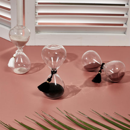 Dekoratīvs stikla smilšu pulkstenis