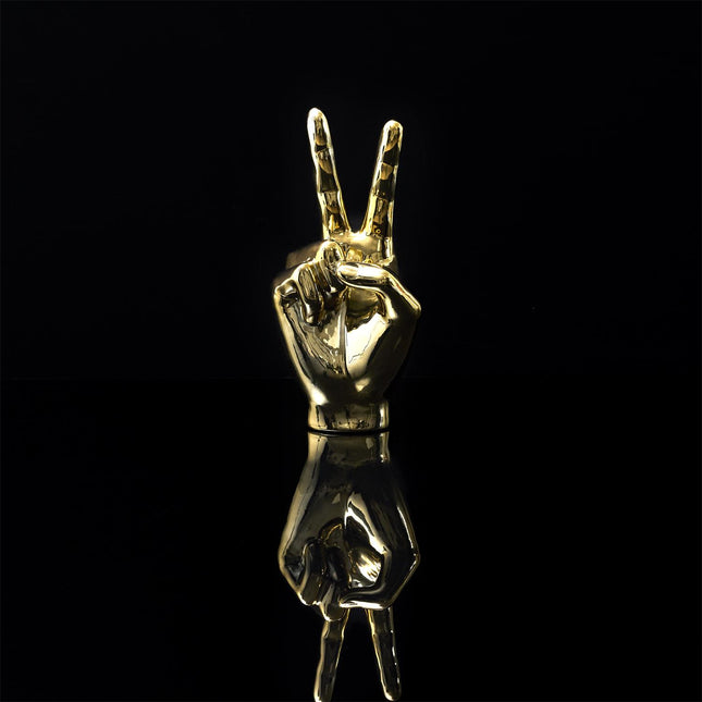 Keramikas dekoratīvā figūra – zelta rokas žests