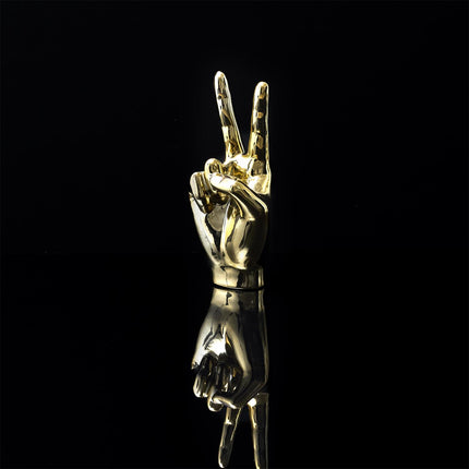 Keramikas dekoratīvā figūra – zelta rokas žests