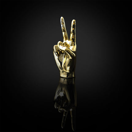 Keramikas dekoratīvā figūra – zelta rokas žests