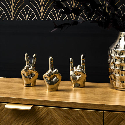 Keramikas dekoratīvā figūra – zelta rokas žests