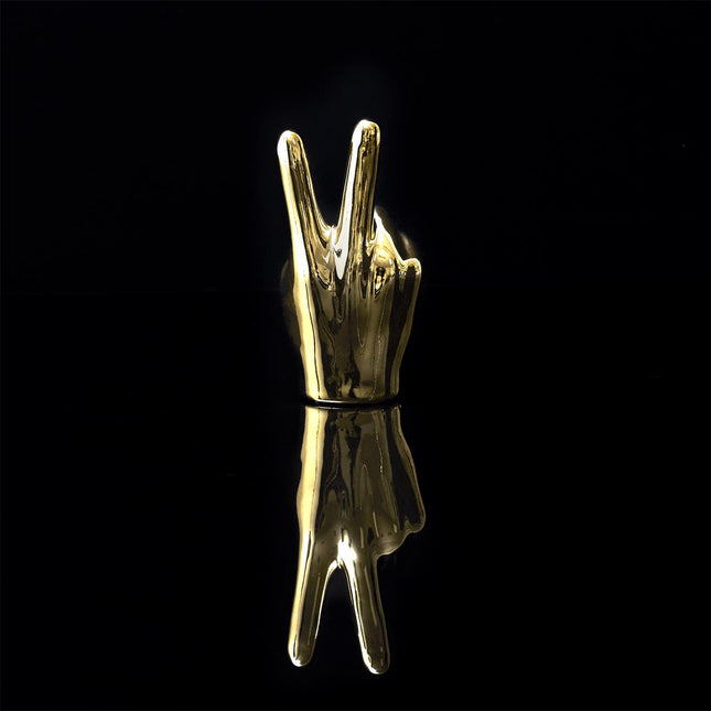 Keramikas dekoratīvā figūra – zelta rokas žests