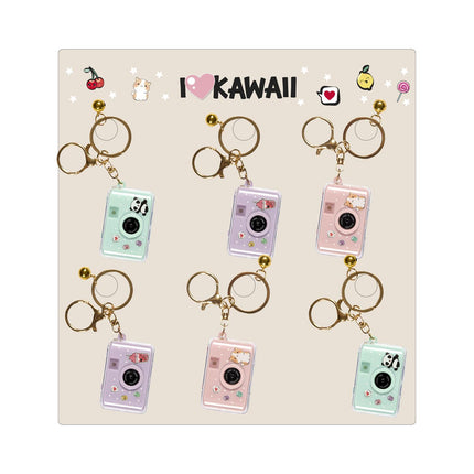 Kawaii fotoaparātiņa piekariņš ar gaismas un skaņas efektu