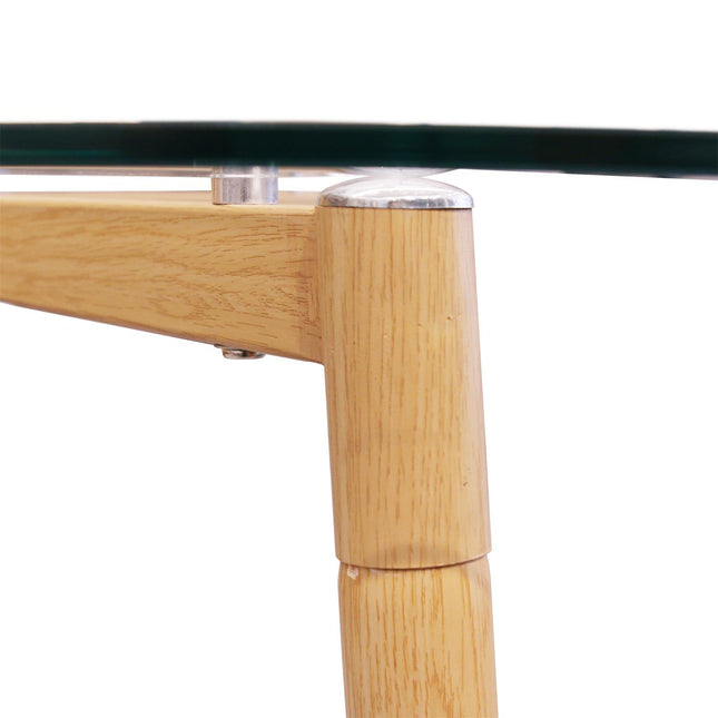 Stikla galds ar koka kājām