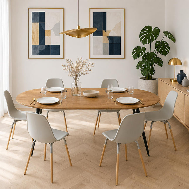 Ovāls izvelkamais ēdamgalds ar ozola toņa MDF virsmu un melnām metāla kājām, 120–160 cm