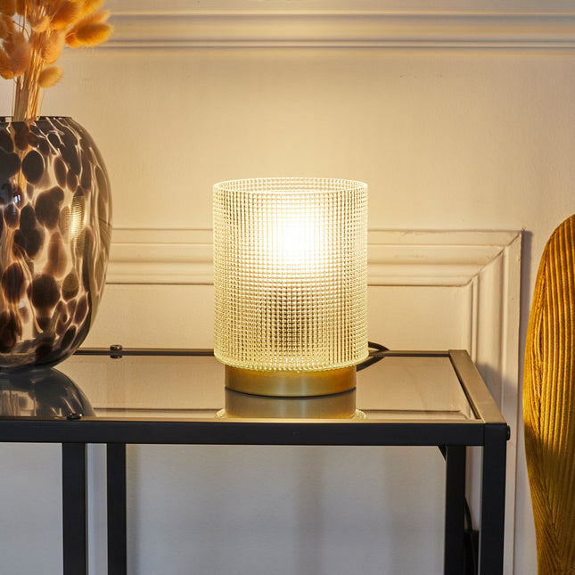 Galda lampa ar teksturētu stiklu un zelta pamatni