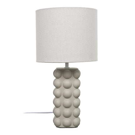 Galda lampa – bēša keramikas lampa ar auduma abažūru