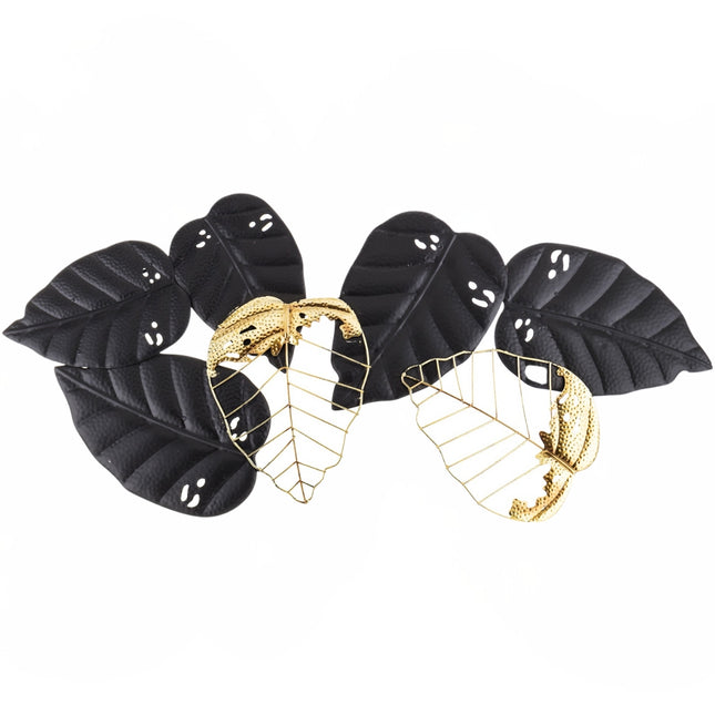 Metāla sienas dekors – lapu kompozīcija