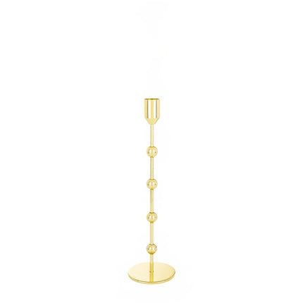 Zelta metāla svečturis – elegants akcents