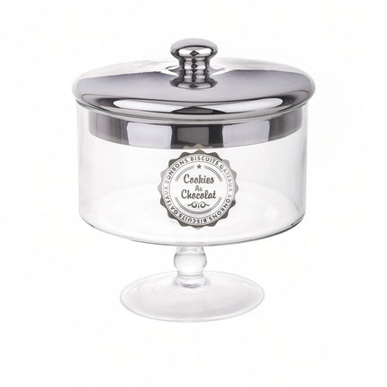 Stikla saldumu trauks uz kājas ar sudraba krāsas vāku