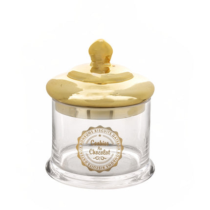 Stikla saldumu trauks ar zelta krāsas vāku