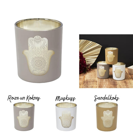 Aromātiskā svece stikla traukā ar zelta Hamsas simbolu