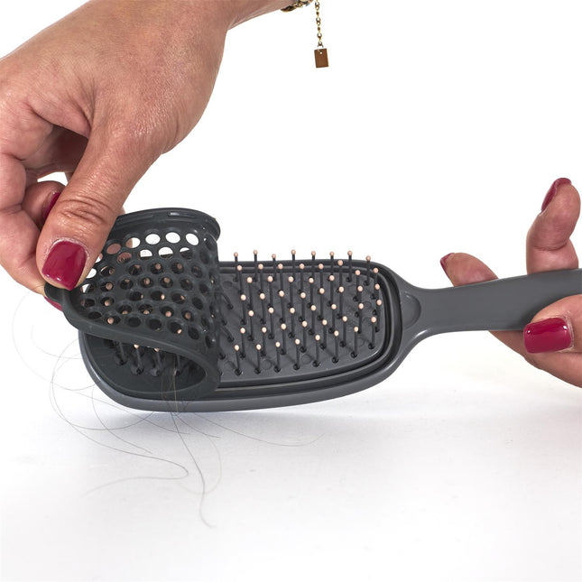 Inovatīva viegli tīrāma matu suka ar elastīgu tīrīšanas izņemamu ieliktni