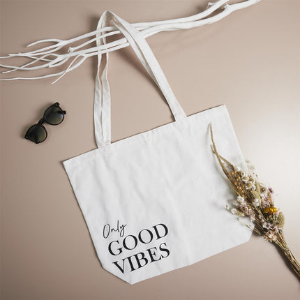 Kokvilnas auduma iepirkumu soma ar tekstu