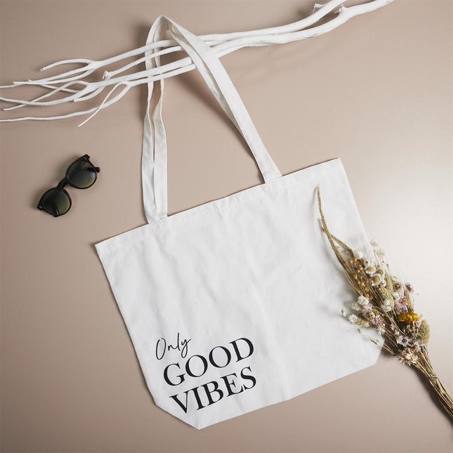 Kokvilnas auduma iepirkumu soma ar tekstu